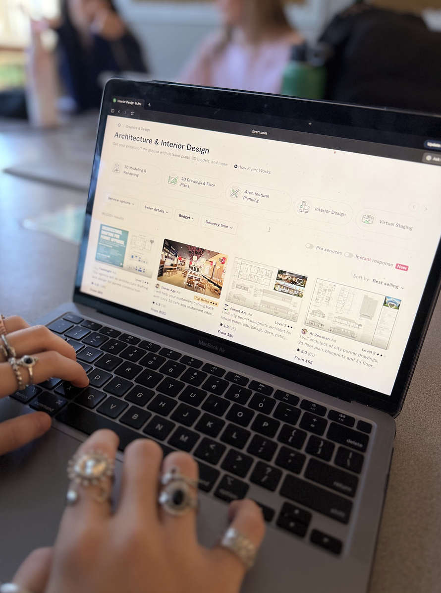 A student looks on fiverr to do architecture gigs. Fiverr is a platform that allowed freelancers to post gigs and then for people to use them. 