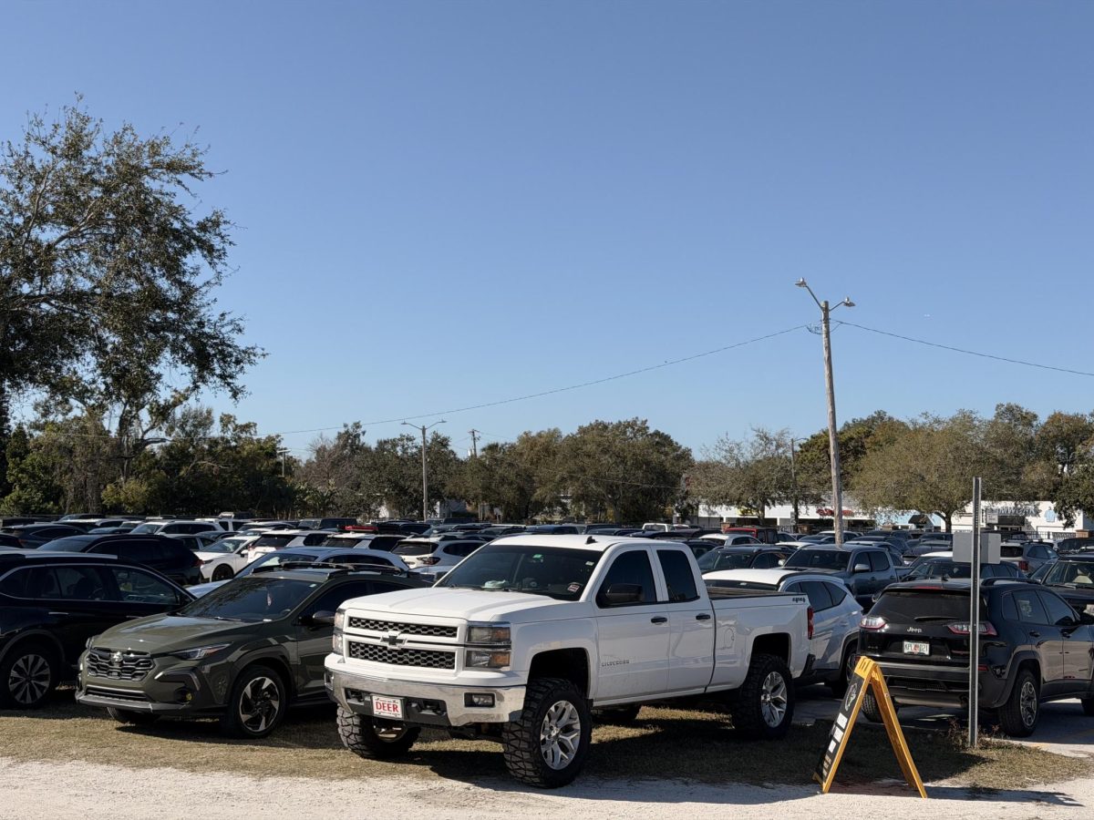 Students fill up all parking spots in school. The capacity of the parking lot is filled up with one of the largest senior and junior classes in the history of plant.