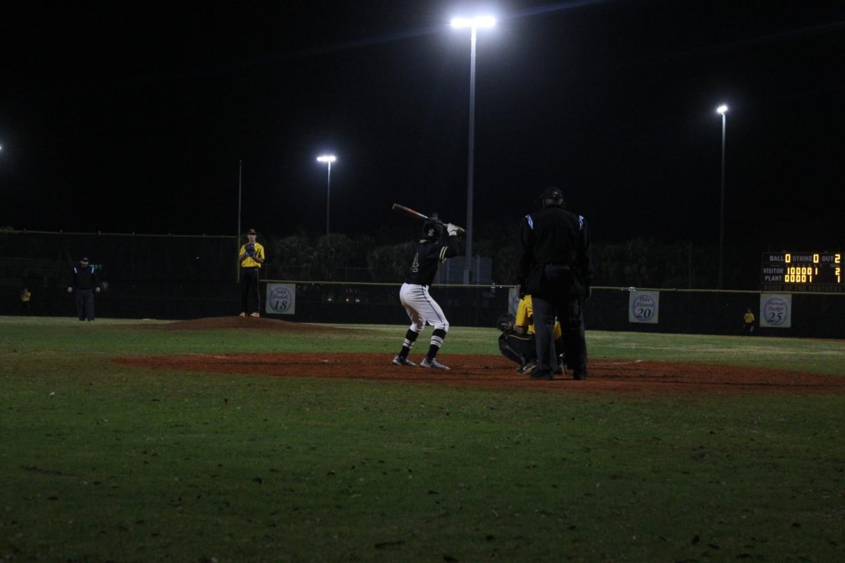 Junior Truman Mayer gets ready to bat at the top of the seventh inning in a tied game. Mayer swung and hit, allowing the Panthers to close out the game in a 3-2 win. 