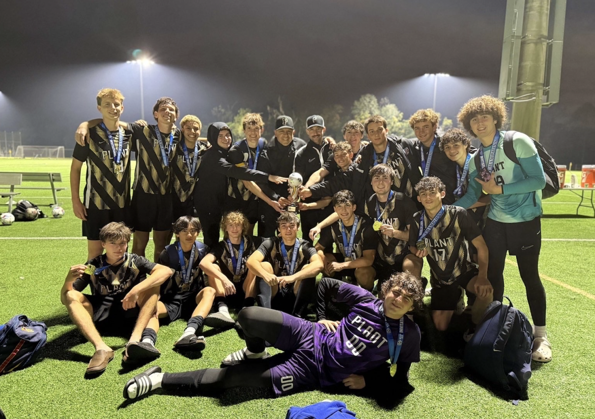 The Plant Mens Soccer team celebrates after a win at a recent game. The boys' season finished with a 15–3–2 record.