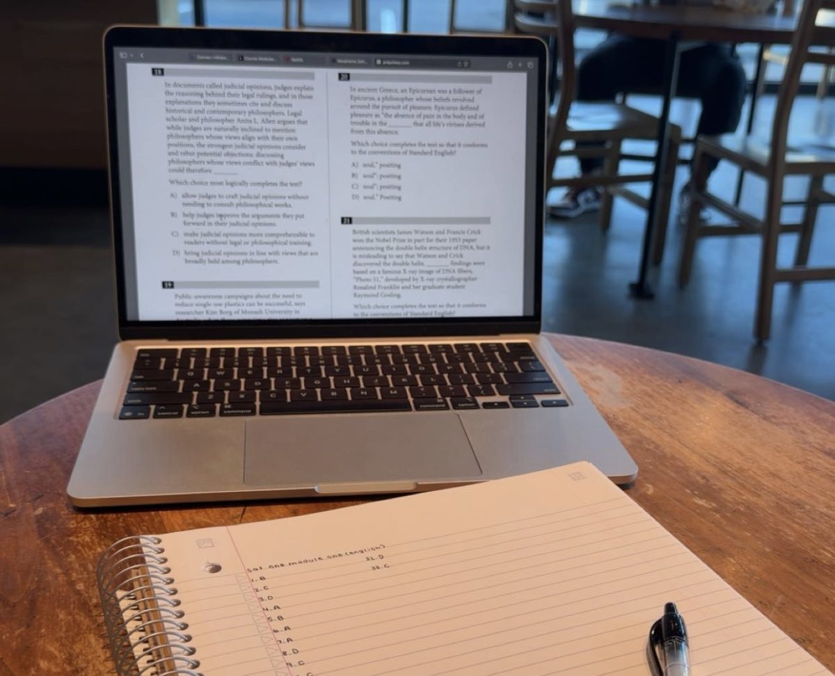 A student studies balancing notes and practicing questions while preparing for college admissions. Earlier in the year, that same student felt overwhelmed by pressure and began questioning whether striving for more than ‘just enough’ was worth it. 